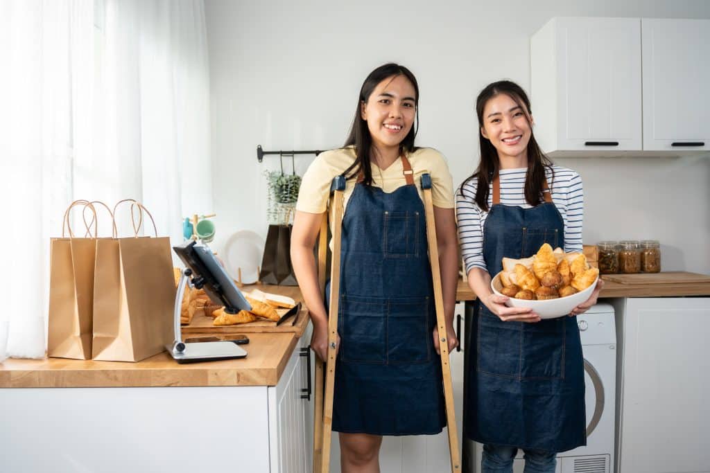 two women operating home based bakery